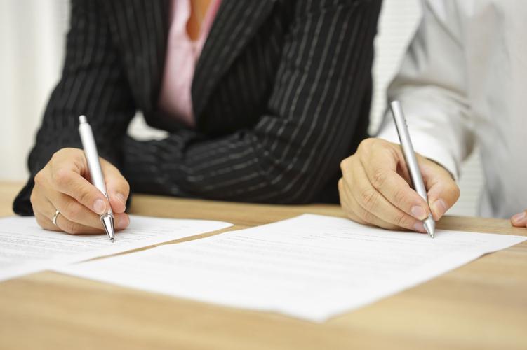 signing contract in the office
