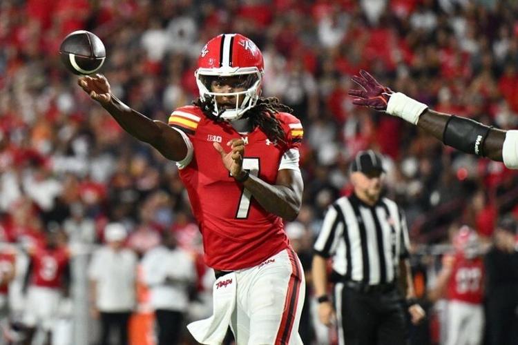 Sep 19, 2026; College Park, Maryland, USA;  Maryland Terrapins quarterback Malik Washington (7) passes in the first half against the Virginia Tech Hokies at SECU Stadium. Mandatory Credit: Jamie Sabau-Imagn Images