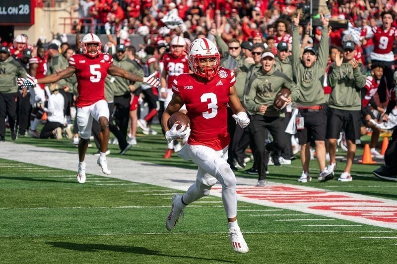 Nov 6, 2021; Lincoln, Nebraska, USA; Nebraska Cornhuskers wide receiver Samori Toure (3) runs for a touchdown during the second quarter against the Ohio State Buckeyes at Memorial Stadium. Mandatory Credit: Dylan Widger-USA TODAY Sports