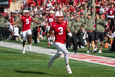 Nov 6, 2021; Lincoln, Nebraska, USA; Nebraska Cornhuskers wide receiver Samori Toure (3) runs for a touchdown during the second quarter against the Ohio State Buckeyes at Memorial Stadium. Mandatory Credit: Dylan Widger-USA TODAY Sports
