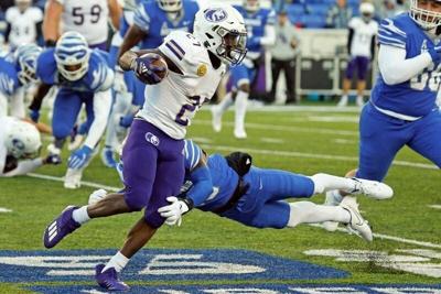 Nov 19, 2022; Memphis, Tennessee, USA; North Alabama Lions running back ShunDerrick Powell (27) runs the ball during the second half against the Memphis Tigers at Simmons Bank Liberty Stadium. Mandatory Credit: Petre Thomas-USA TODAY Sports