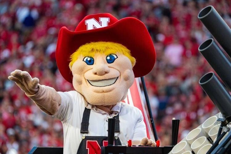 Sep 14, 2024; Lincoln, Nebraska, USA; Nebraska Cornhuskers mascot Herbie Husker rides around the field between the first and second quarter against the Northern Iowa Panthers at Memorial Stadium. Mandatory Credit: Dylan Widger-Imagn Images