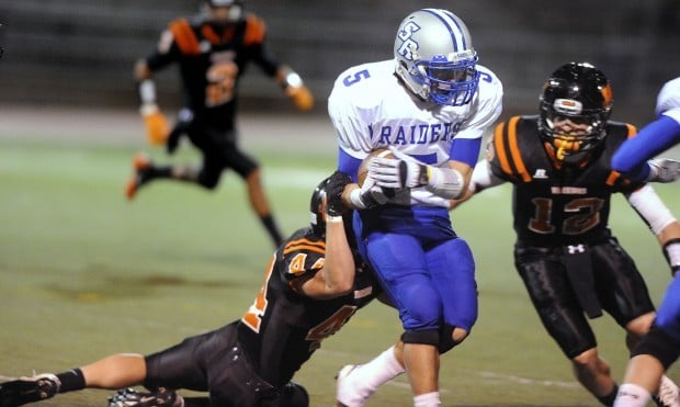 High School Football: Injury-riddled Raiders no match for Warriors