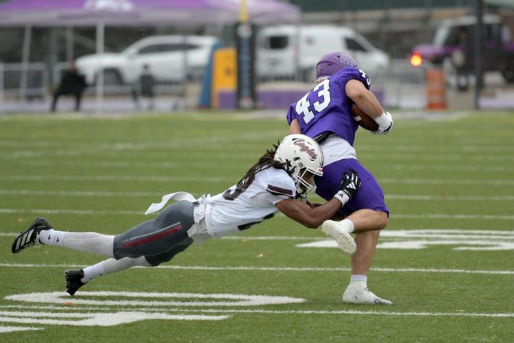 Jahmir Everett tackles at NMHU.jpg