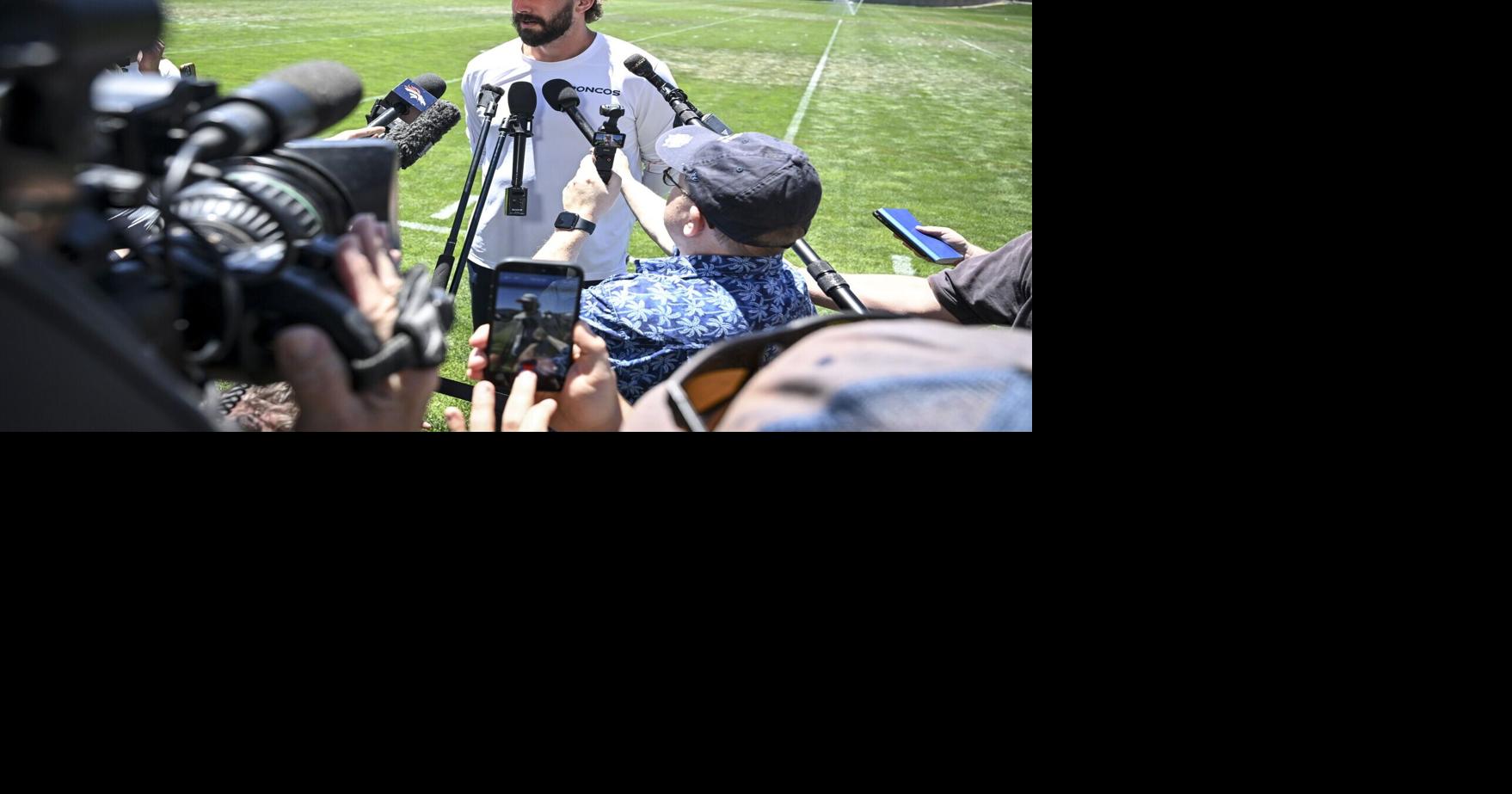 Offensive coordinator Davis Webb of the Denver Broncos speaks to members of the media during OTAs at the Broncos Park in Centennial, Colorado on Thursday, June 11, 2026.