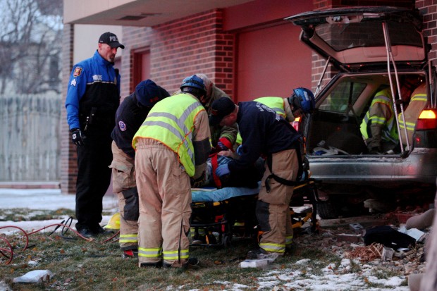 Two Injured After Car Crashes Into Funeral Home