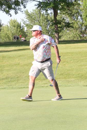 2-M--Judd Makes long putt-best IMG_0359.JPG