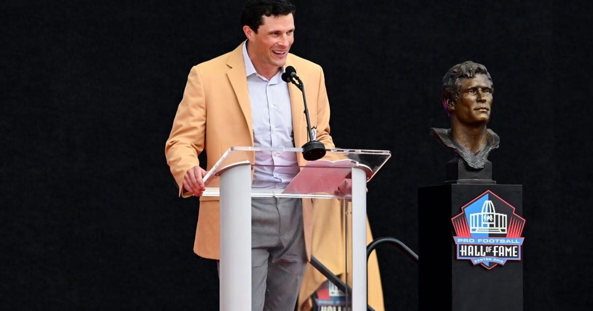 Luke Kuechly speaks during the Pro Football Hall of Fame Enshrinement Ceremony at Tom Benson Hall of Fame Stadium on Saturday, Aug. 8, 2026, in Canton, Ohio.