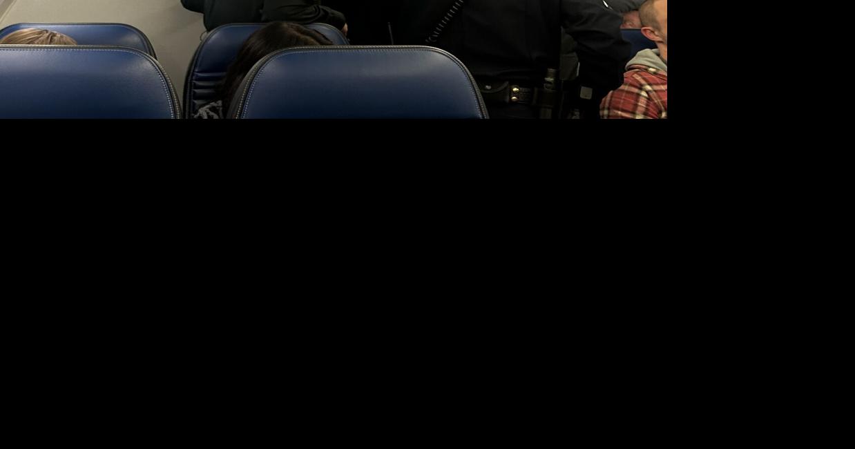 Passenger tries to force his way into cockpit of flight bound for Rapid City