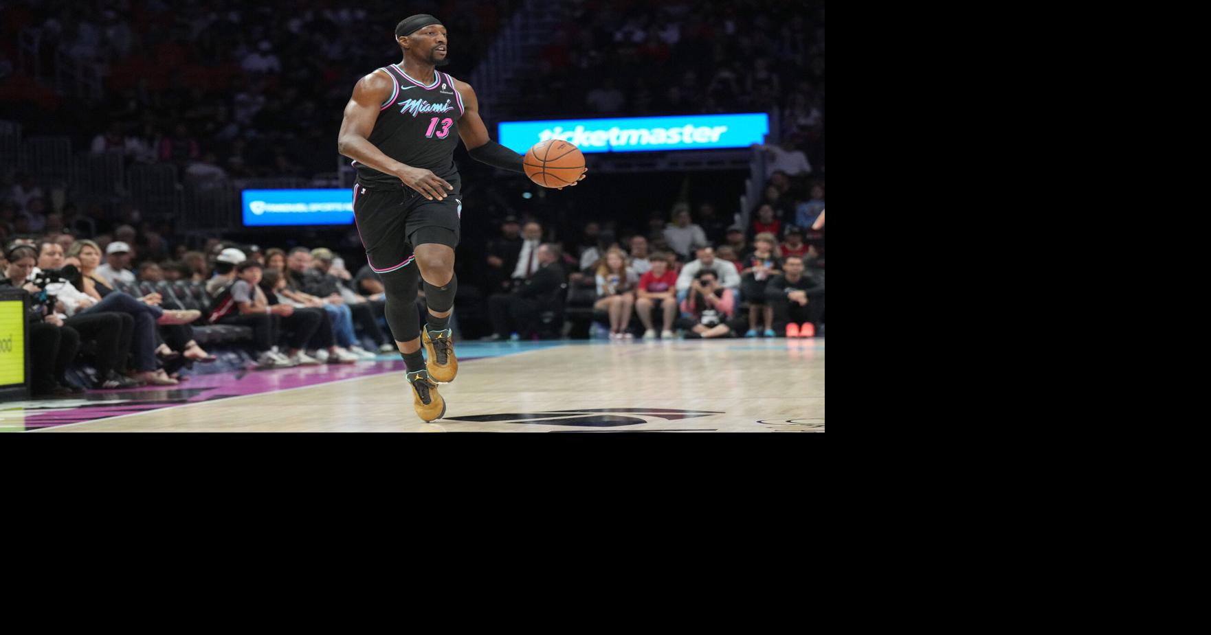 Miami Heat center Bam Adebayo brings the ball up the court against the Washington Wizards during the first half at Kaseya Center.