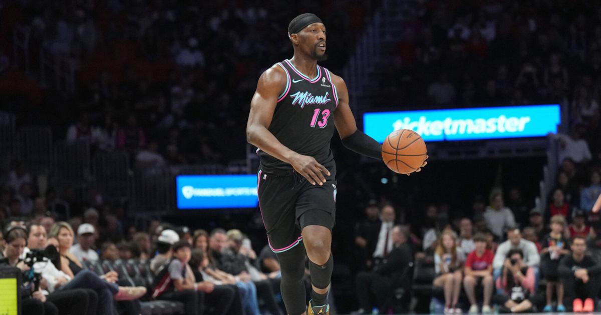 Miami Heat center Bam Adebayo brings the ball up the court against the Washington Wizards during the first half at Kaseya Center.