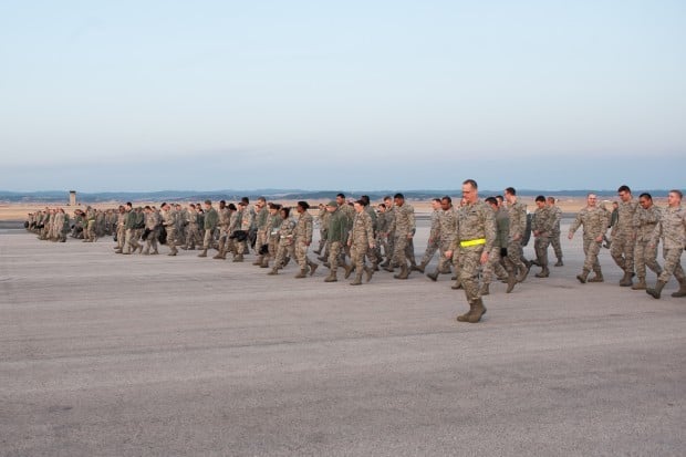 Airmen check for debris on runway