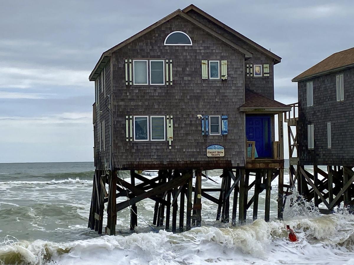 Erosion sends 10 homes collapsing into the Carolina surf