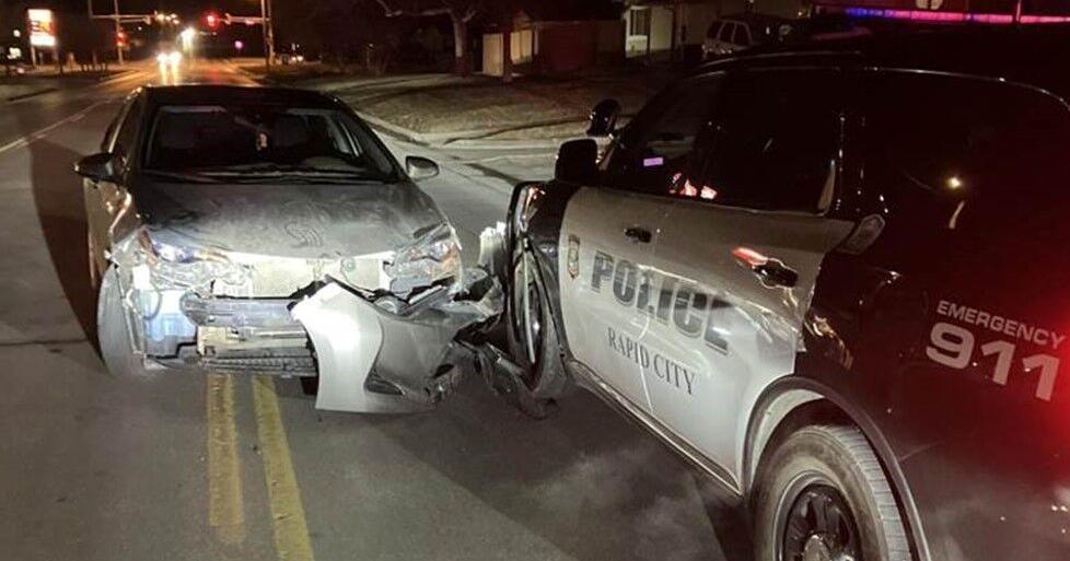 Rapid City man arrested after crashing into police vehicle