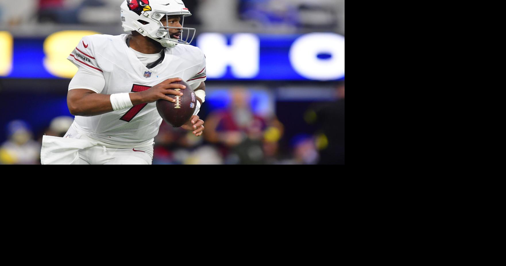 Jan 4, 2026; Inglewood, California, USA; Arizona Cardinals quarterback Jacoby Brissett (7) rolls out against the Los Angeles Rams during the second half at SoFi Stadium. Mandatory Credit: Gary A. Vasquez-Imagn Images