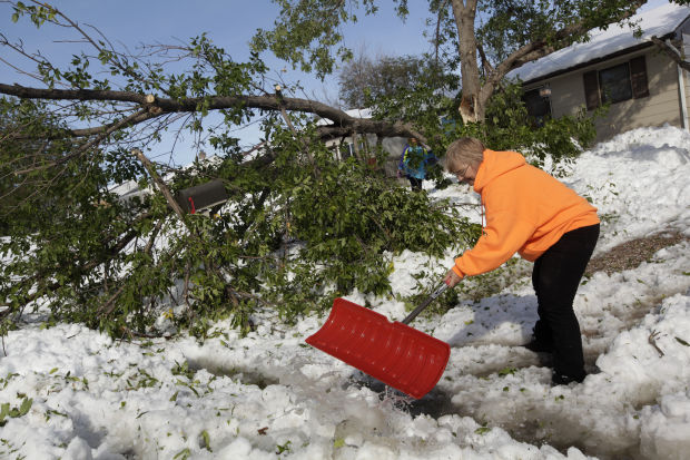 Residents dig out after record-breaking storm buries area