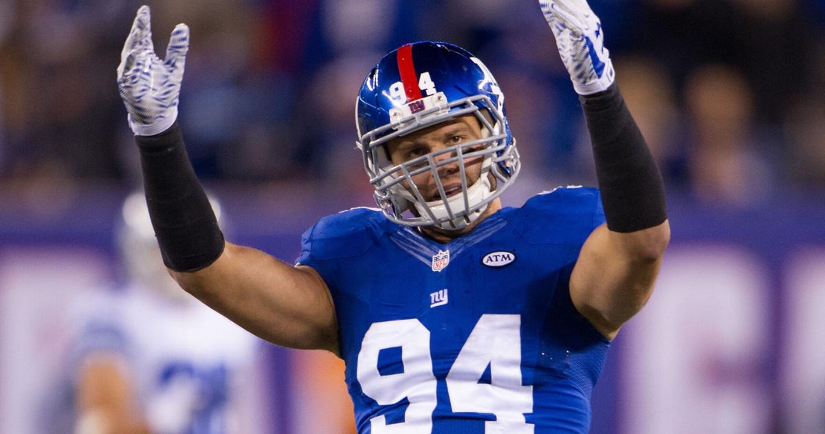 Oct 25, 2015; East Rutherford, NJ, USA; New York Giants outside linebacker Mark Herzlich (94) gets the crowd going in the 4th quarter against the Dallas Cowboys at MetLife Stadium. Mandatory Credit: William Hauser-USA TODAY Sports