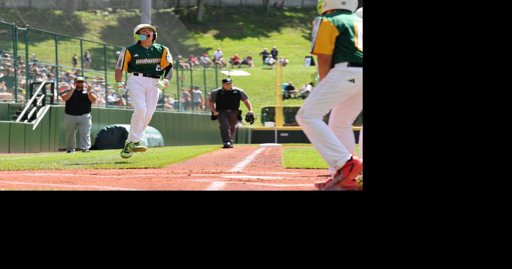 Cooper Thissen of Davenport, Iowa, (Midwest Region) rouns the bases after hitting a solo homerun in the first inning against