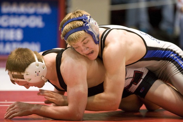 High School Wrestling: Jensen signs to wrestle at UNI