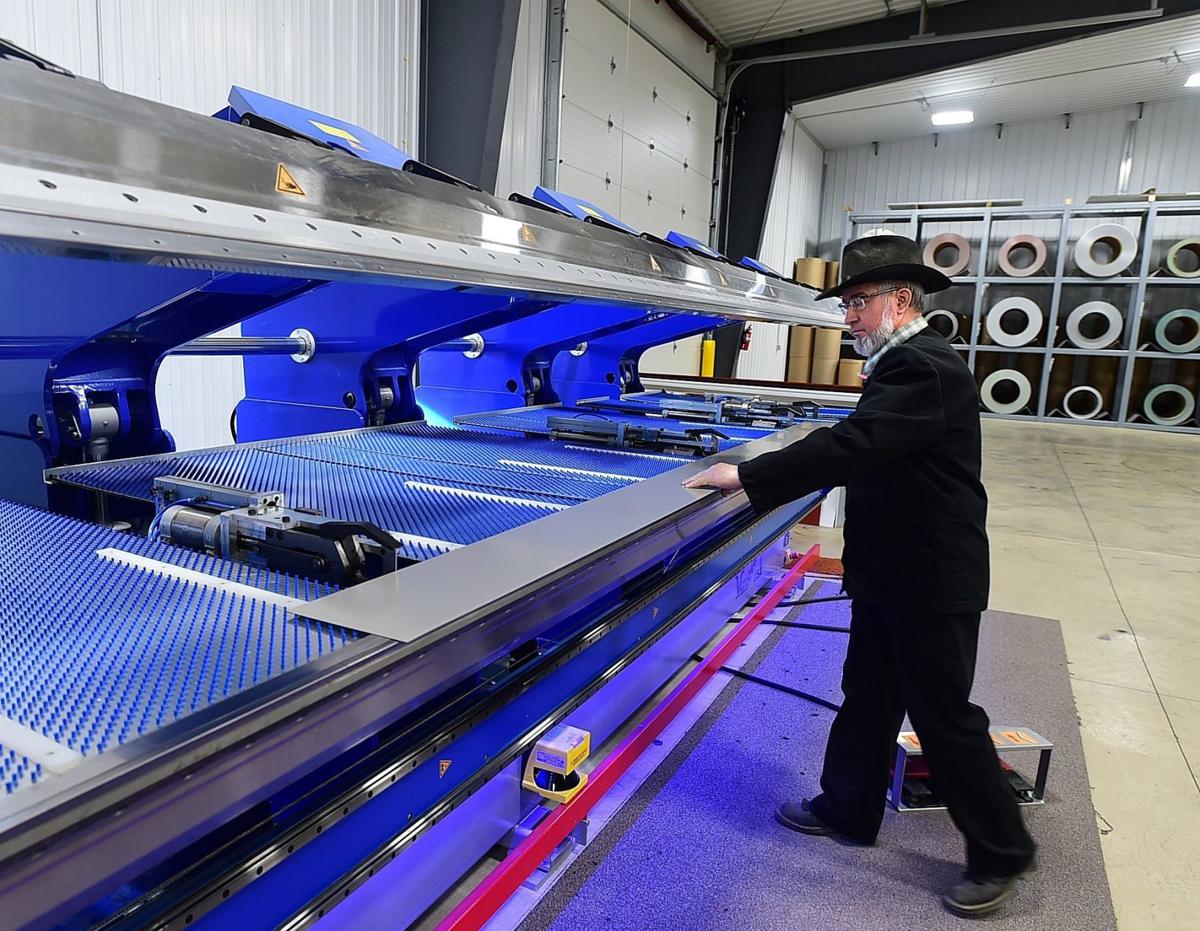 Hutterite colony using to sell steel siding, trim News