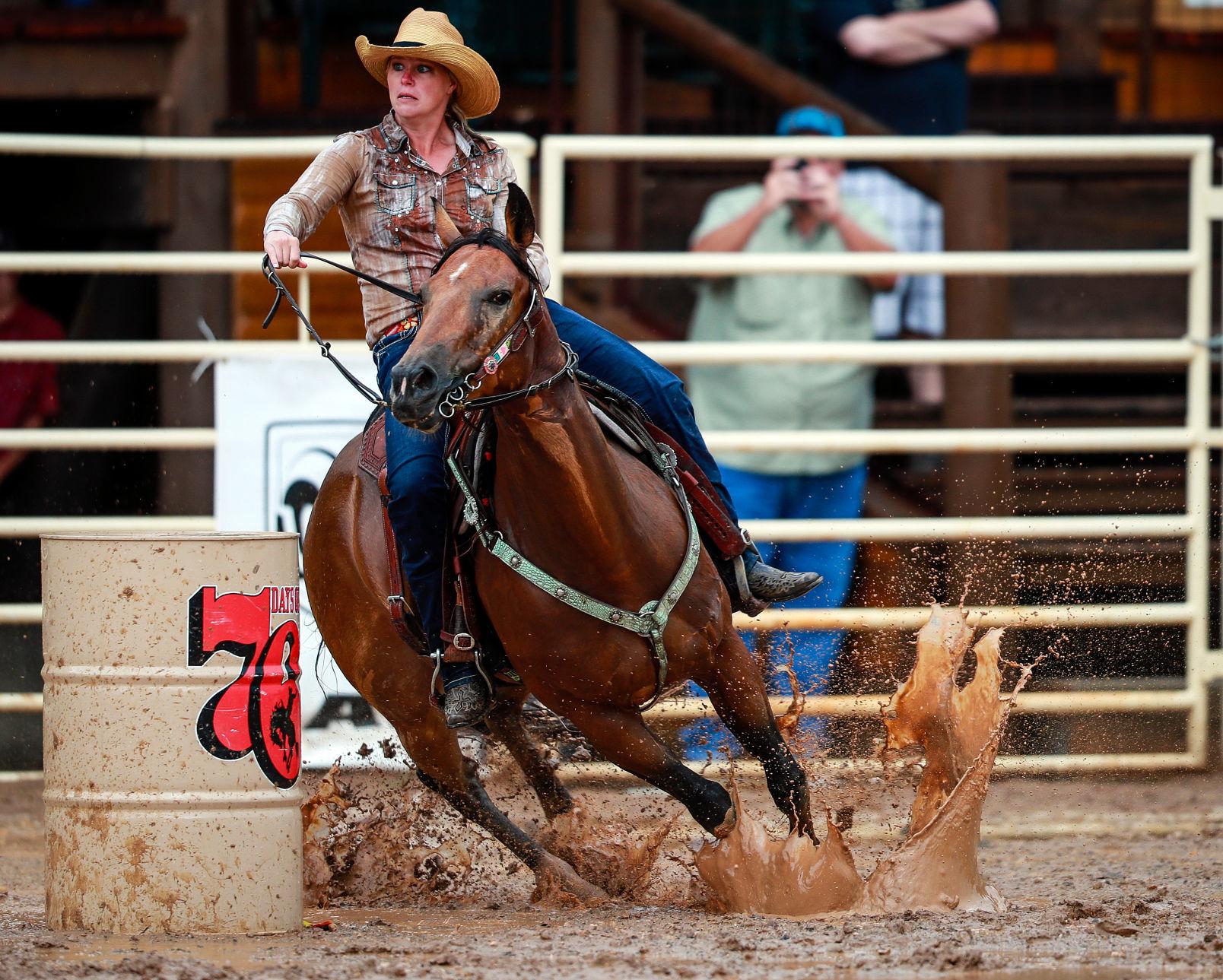 PHOTOS Saturday afternoon's sloppy PRCA Rodeo in Deadwood Rodeo