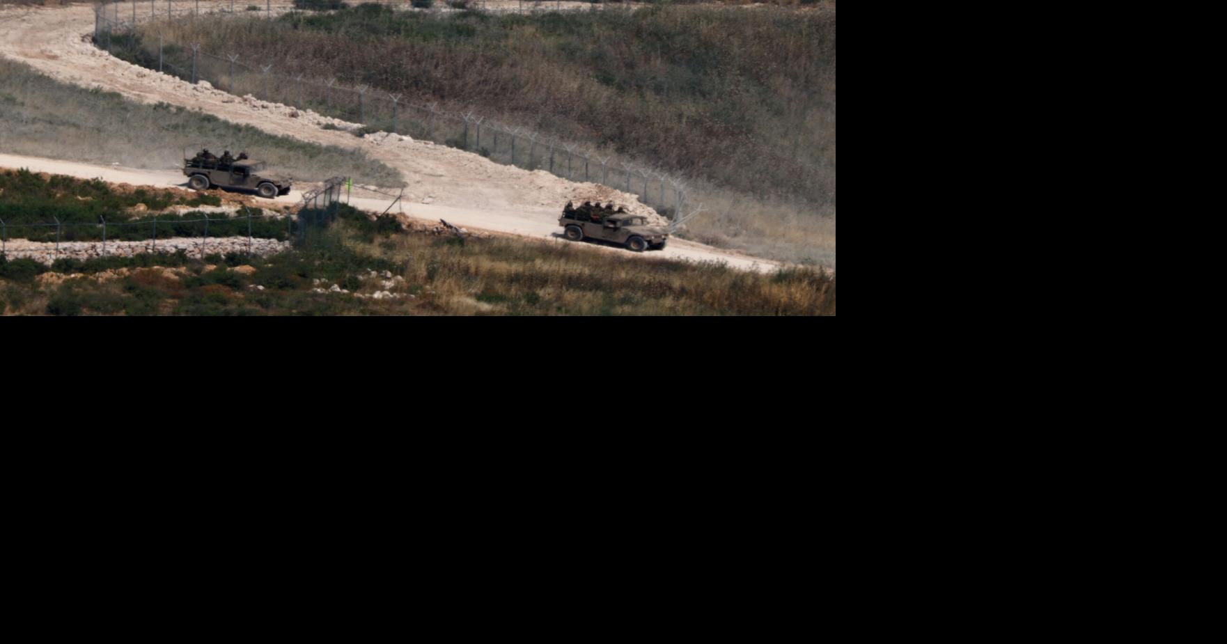 Israeli military vehicles maneuver in southern Lebanon, near the border with Israel