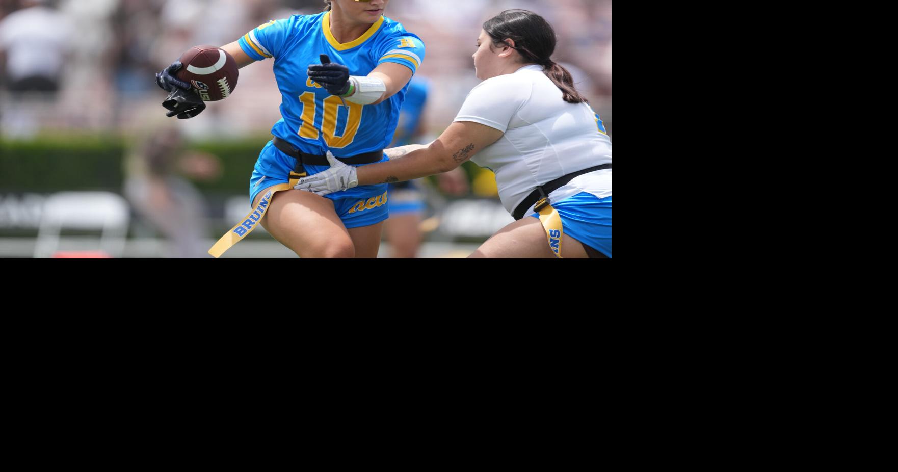May 2, 2026; Pasadena, CA, USA; Members of the UCLA Bruins women's flag football club team participate in an exhibition during the spring game at Rose Bowl.