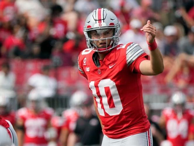 Ohio State Buckeyes quarterback Julian Sayin (10) calls out a play against Kent State Golden Flashes in the third quarter of the NCAA football game at Ohio Stadium on Sept. 19, 2026.