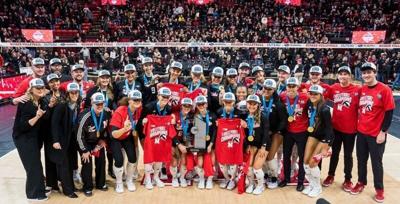 Nov 28, 2025; Lincoln, Neb, USA; The 2025 Big Ten Volleyball Champion Nebraska Cornhuskers pose after the match against the Penn State Nittany Lions at Bob Devaney Sports Center. Mandatory Credit: Dylan Widger-Imagn Images