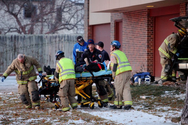 Two injured after car crashes into funeral home