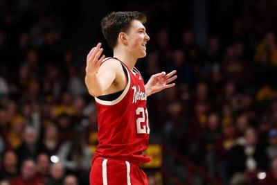 Jan 24, 2026; Minneapolis, Minnesota, USA; Nebraska Cornhuskers forward Pryce Sandfort (21) celebrates his three-point basket against the Minnesota Golden Gophers during the second half at Williams Arena. Mandatory Credit: Matt Krohn-Imagn Images
