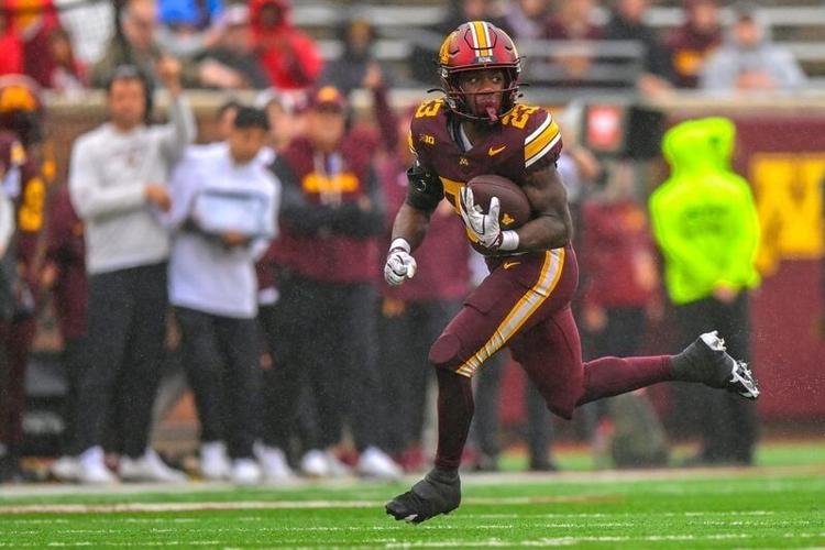 Sep 19, 2026; Minneapolis, Minnesota, USA;  Minnesota Golden Gophers running back TJ Thomas (23) on his way to a 71-yard touchdown run against the Akron Zips during the second half at Huntington Bank Stadium.  Mandatory Credit: Nick Wosika-Imagn Images