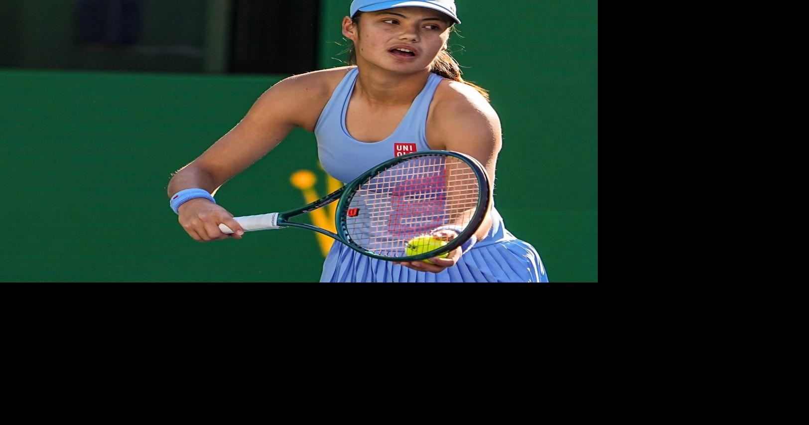 Emma Raducanu gets set to serve to Amanda Anisimova during their third-round match at the BNP Paribas Open in Indian Wells,
