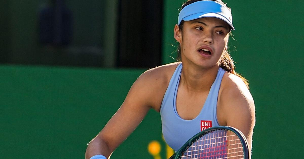 Emma Raducanu gets set to serve to Amanda Anisimova during their third-round match at the BNP Paribas Open in Indian Wells,