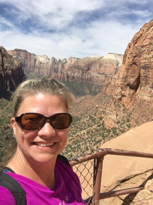 Carrie with Zion National Park in background