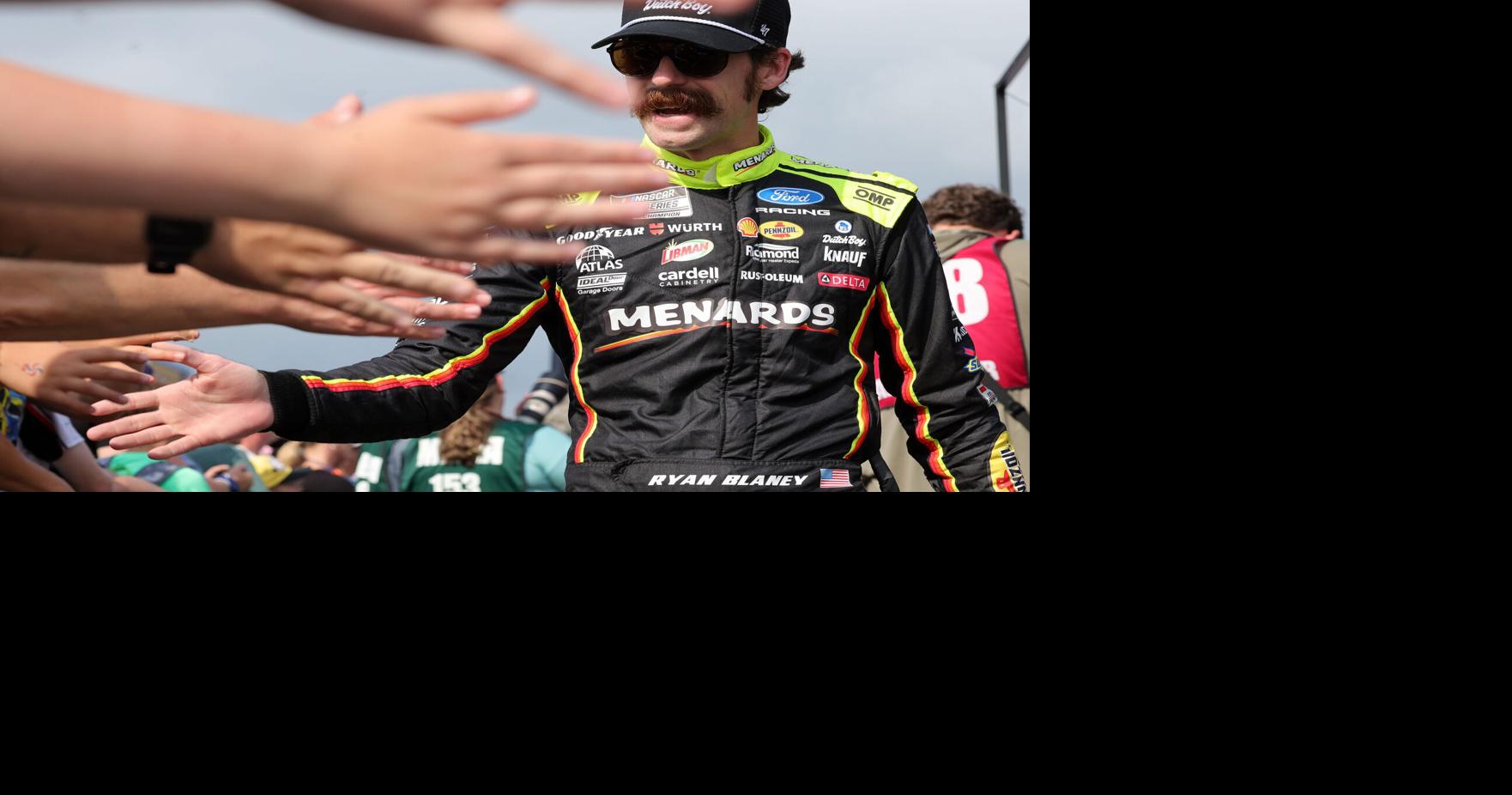 Jul 5, 2026; Joliet, Illinois, USA; NASCAR Cup Series driver Ryan Blaney (12) shakes hands with fans before the eero 400 at Chicagoland Speedway. Mandatory Credit: Mike Dinovo-Imagn Images