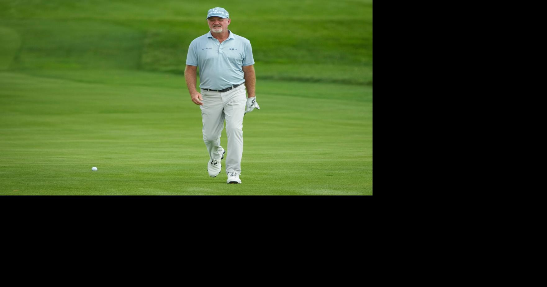 Jerry Kelly walks across the 18th green during the first round of the U.S. Senior Open at Scioto Country Club in Columbus on