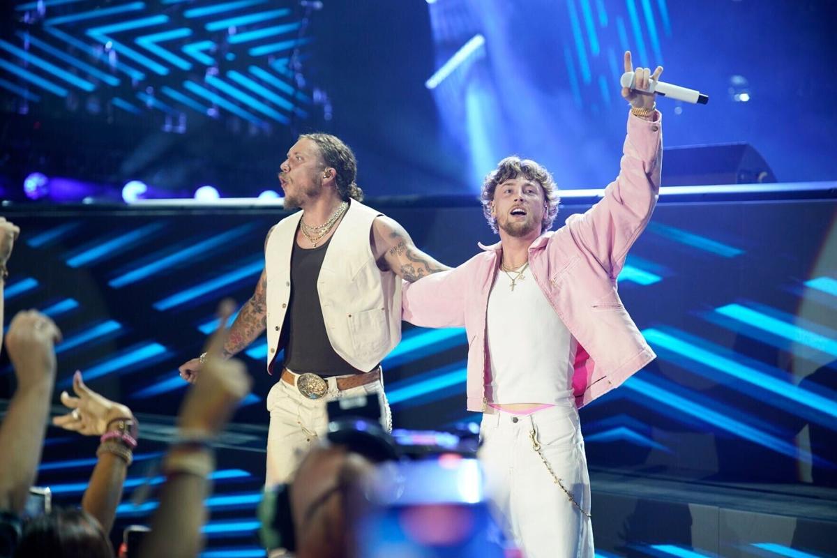 Brandon Lake joins Bailey Zimmerman onstage during the fourth night of CMA Fest at Nissan Stadium in Nashville, Tenn., Sunday,