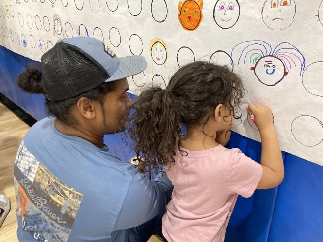RCPA block party community mural dad and girl