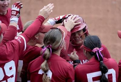 Oklahoma's Ella Parker (5) celebrates a home run during the college softball game between the Oklahoma Sooners and the Georgia Bulldogs at Love's Field in Norman, Okla., Saturday, April, 25, 2026.