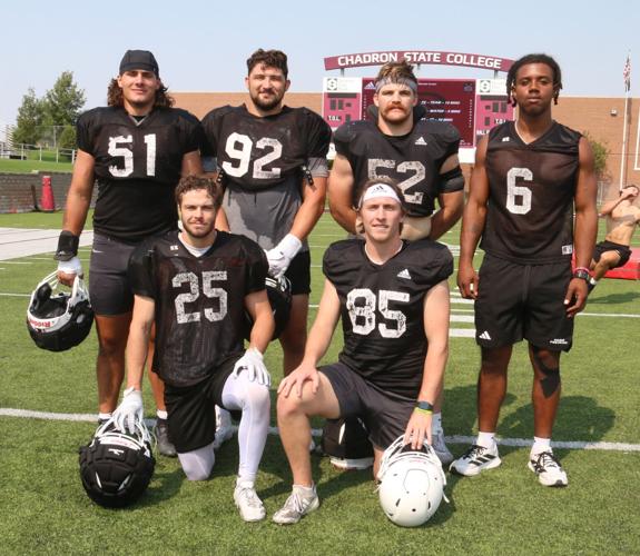 CSC FB Defense Seniors again _0283.JPG