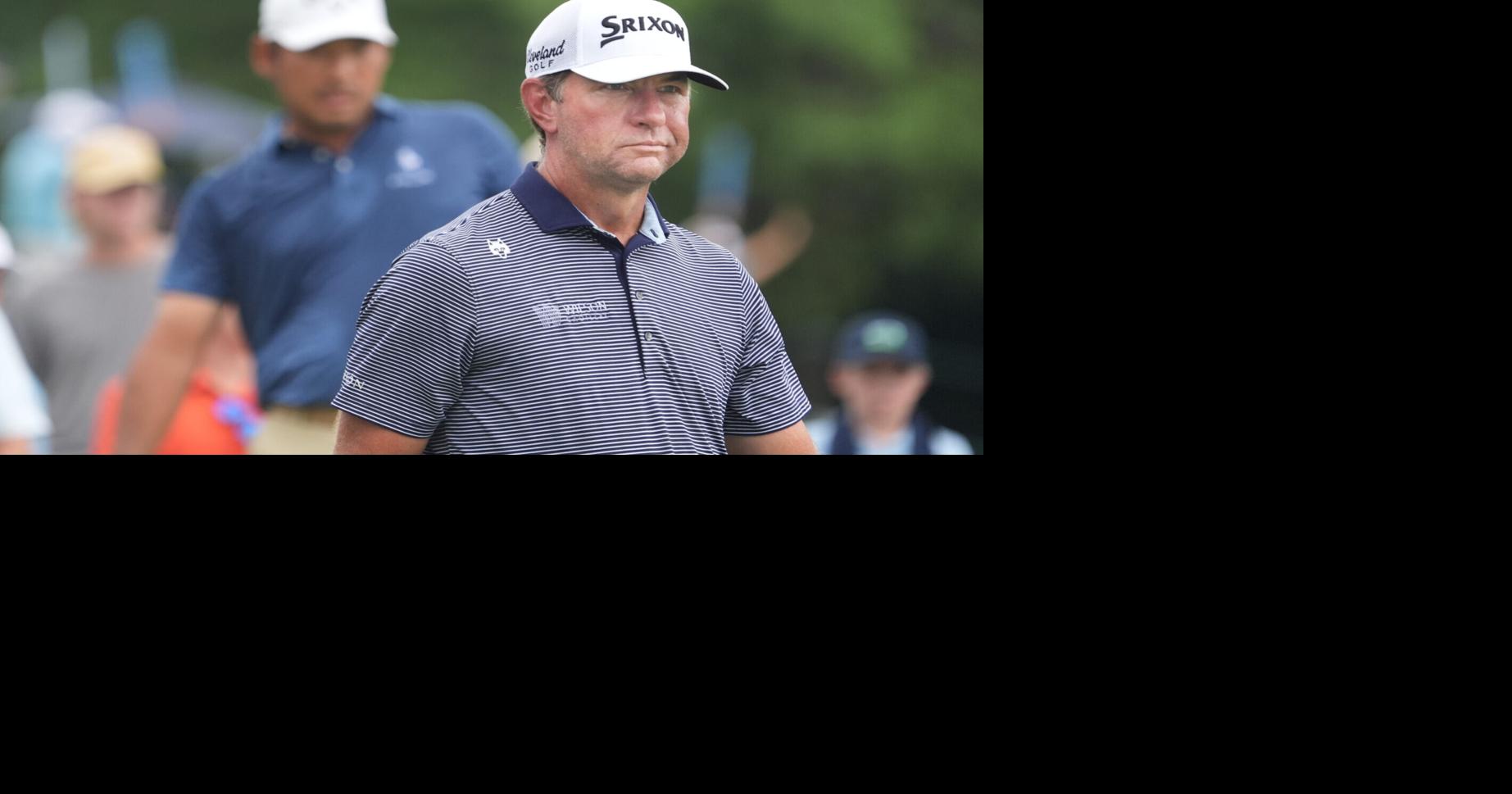 Lucas Glover heads down the fairway after driving the ball off the 1st tee to start of the third round of the ISCO Golf