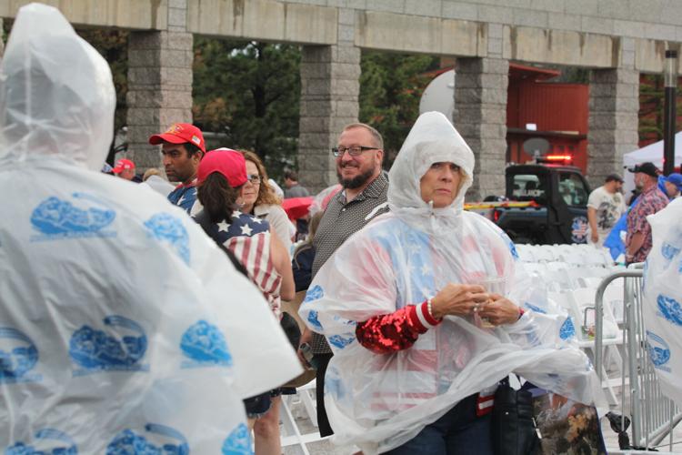 Crowds wearing rain jackets