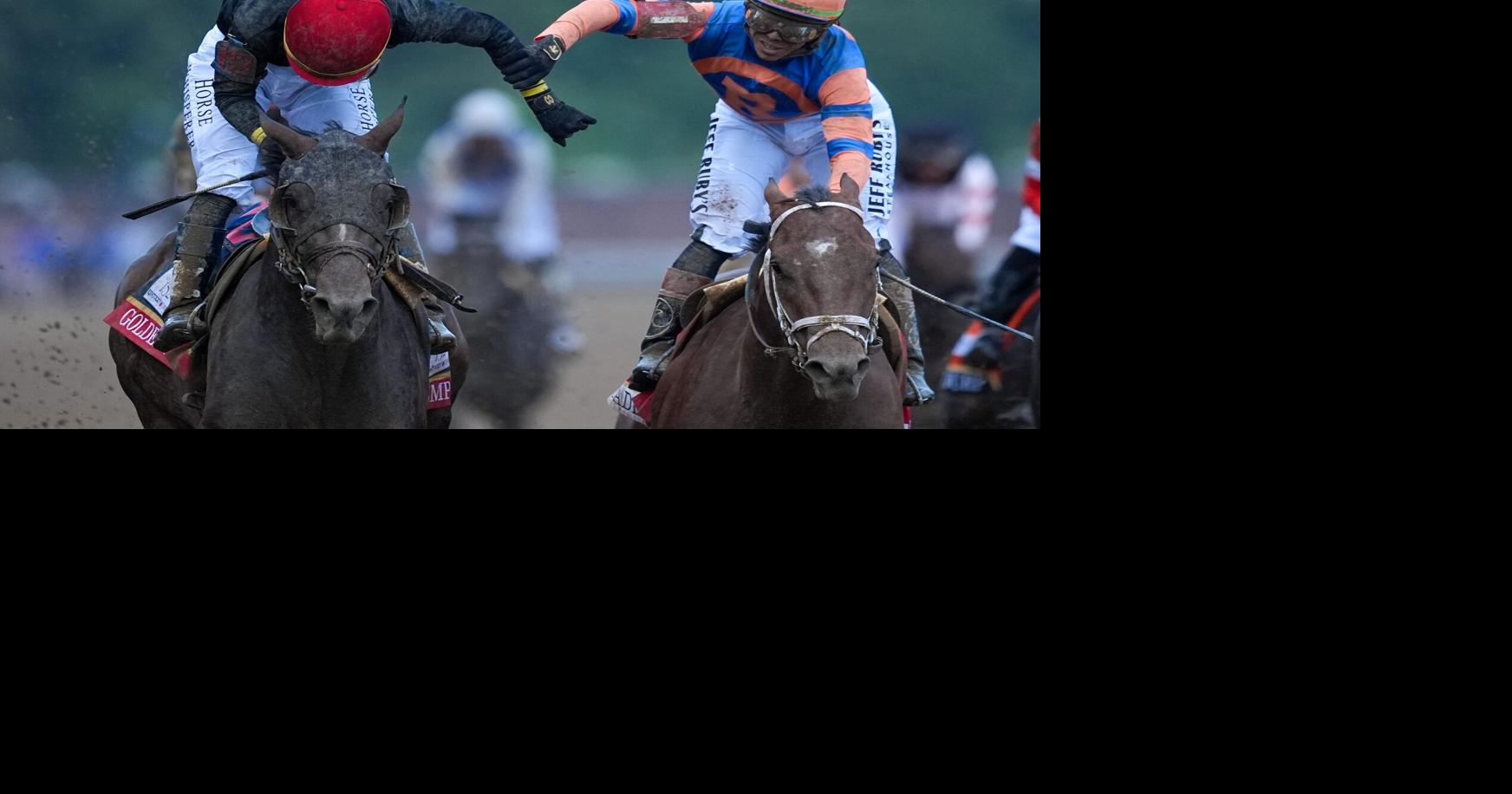 Golden Tempo, with Jose Ortiz up, left, gets congratulated by his brother, Irad, aboard Reneegade, after he wins the Kentucky