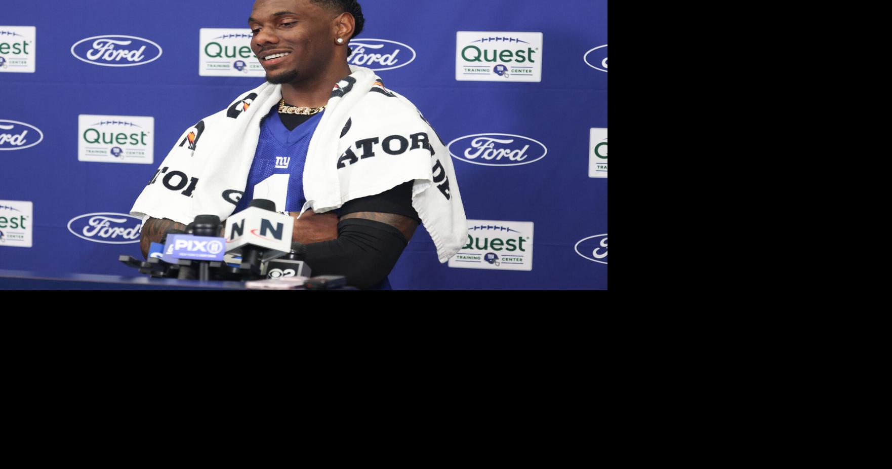 Jul 23, 2025; East Rutherford, NJ, USA; New York Giants wide receiver Malik Nabers (1) talks with media during training camp at Quest Diagnostics Training Center. Mandatory Credit: Vincent Carchietta-Imagn Images