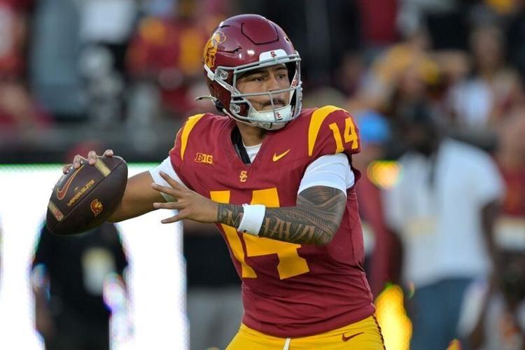 Oct 11, 2025; Los Angeles, California, USA; USC Trojans quarterback Jayden Maiava (14) throws a pass in the first half against the Michigan Wolverines at United Airlines Field at the Los Angeles Memorial Coliseum. Mandatory Credit: Jayne Kamin-Oncea-Ima...