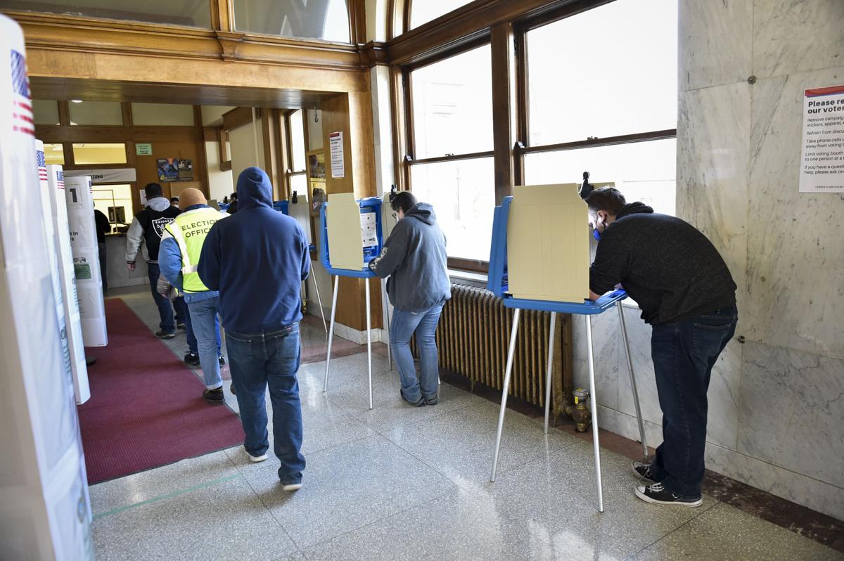 Voters cast their ballots