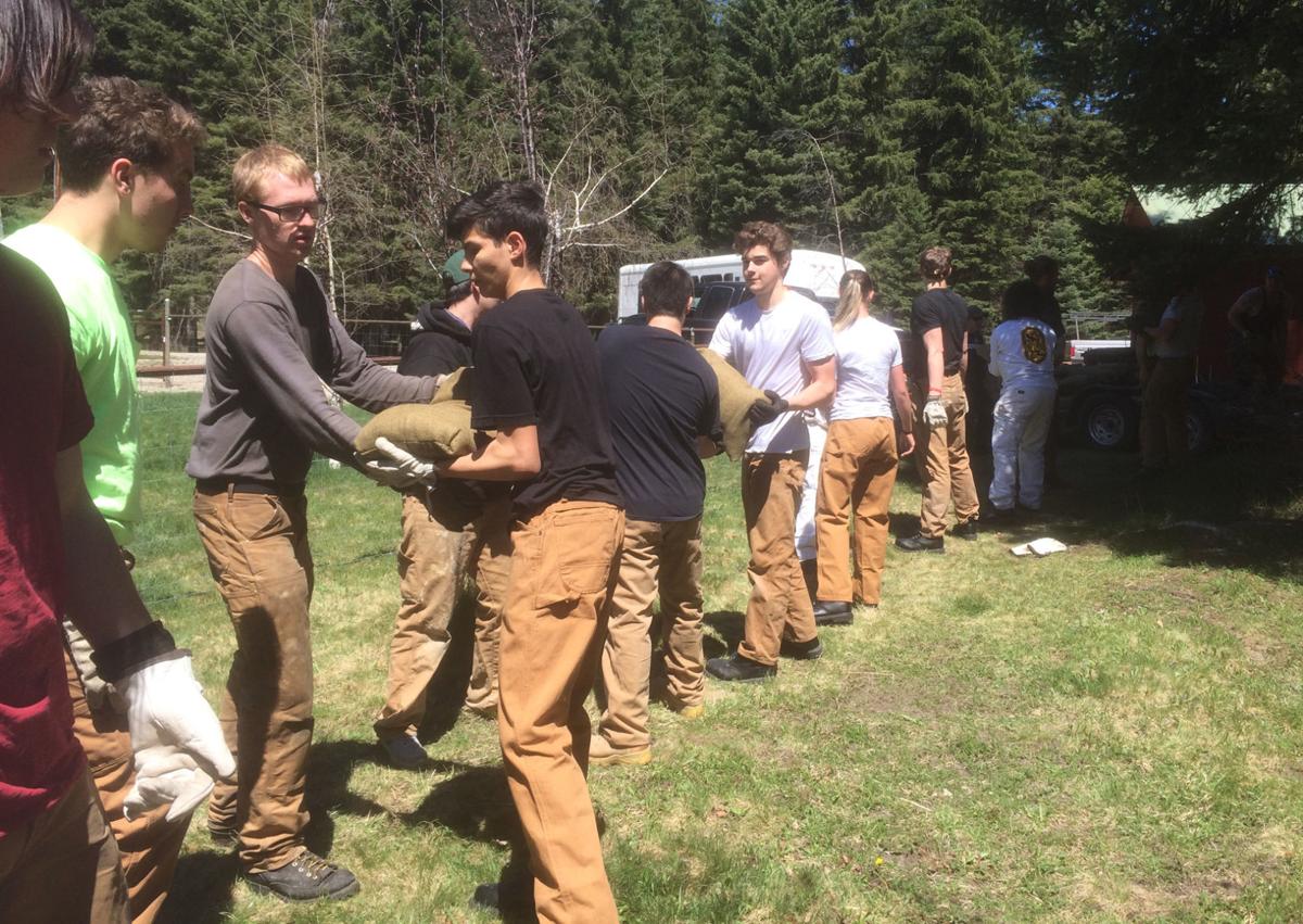 Sandbagging begins Trapper Creek Job Corps volunteers turn out to help