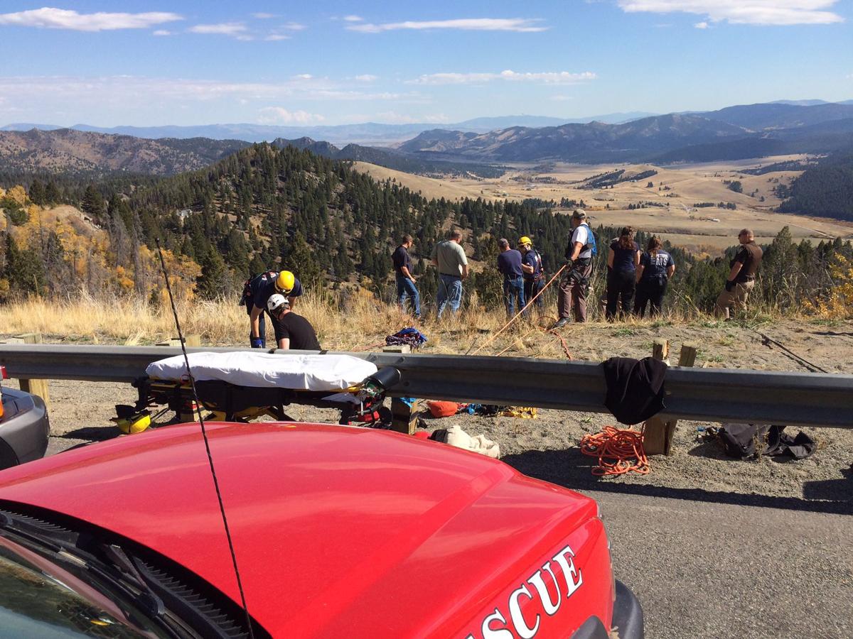 Vehicle drives off MacDonald Pass