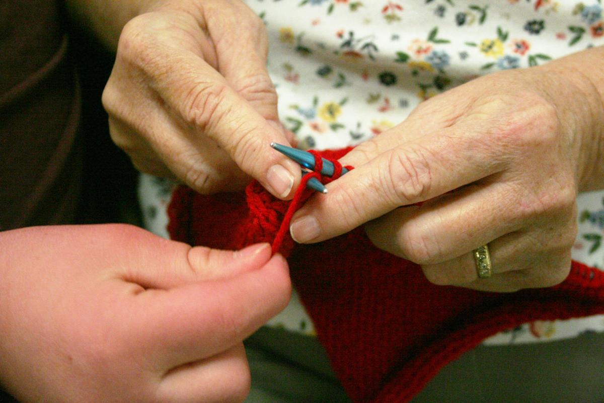 Knit together Volunteers teach middle school students the art of